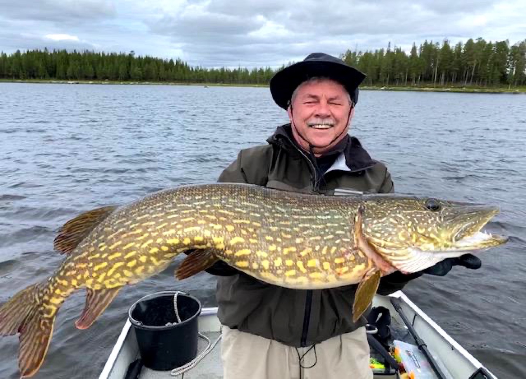 Pike fishing from a boat near Wild Lake Lodge